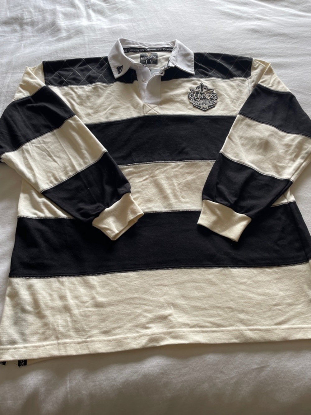 Guinness Black and Cream Striped Rugby Polo